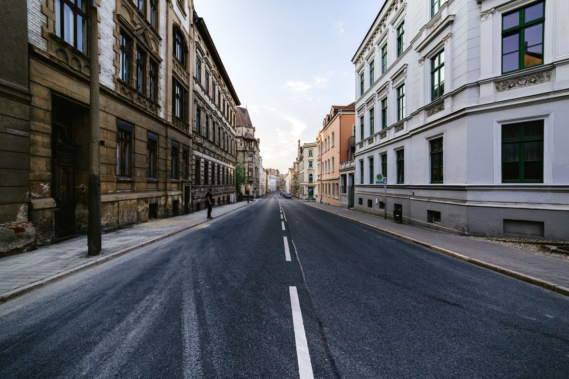 View Of Buildings Along Road